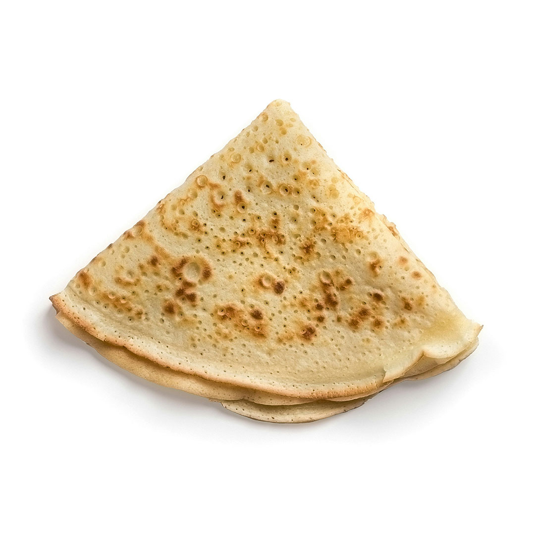 Vue sur une crêpe sur fond blanc, le Yacht Café, crêperie Carnon.